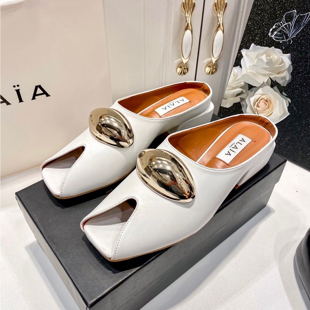Alaia White and Gold Sandals with Metallic Accents